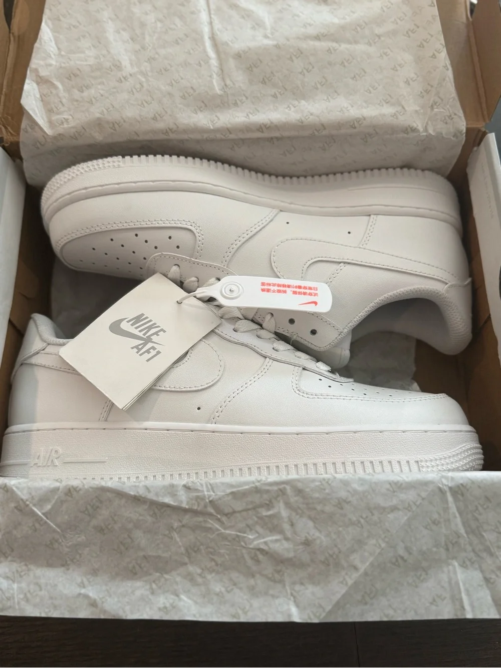 Nike AF1 Low 'Triple White' Leather Sneakers